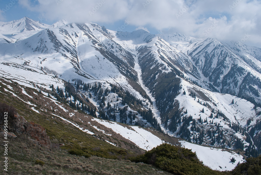 Snowy mountain ranges in Alatau near Almaty, Kazakhstan