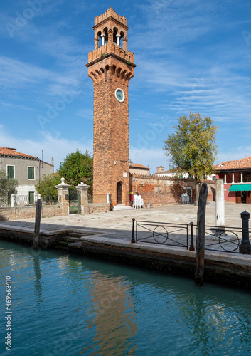 View of the clock tower in the island of Murano, Venice, Italy.