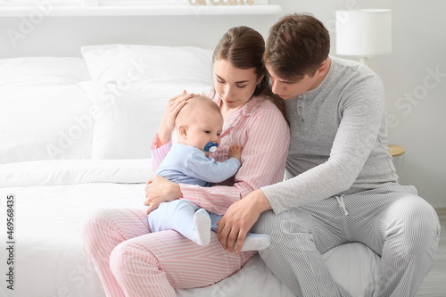Young parents bonding with ...
