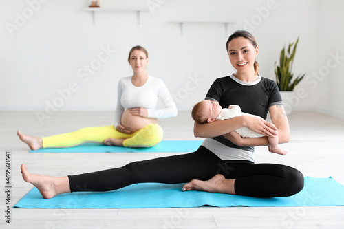 Young pregnant woman doing ...