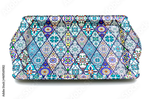Metal tray with traditional Turkish ornament on a white background.