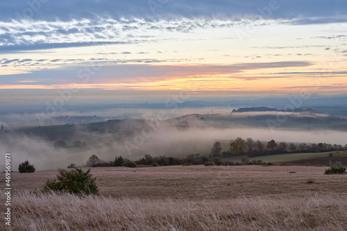 Hills in the morning fog. Blur in the fog.