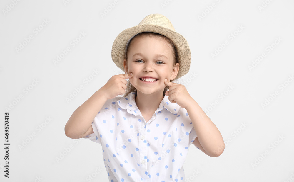 Portrait of happy smiling little girl on light background Portrait of happy smiling little girl on light background