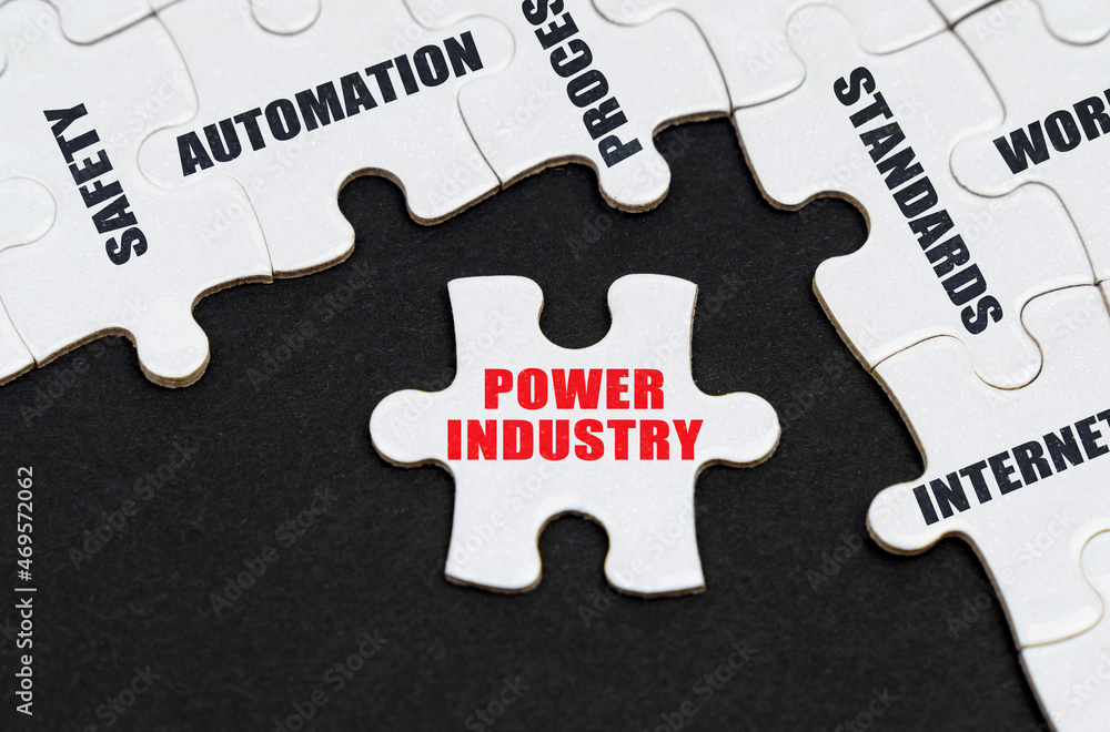 On a black background, puzzles with inscriptions, on a separate puzzle there is an inscription - Power Industry On a black background, puzzles with inscriptions, on a separate puzzle there is an inscription - Power Industry