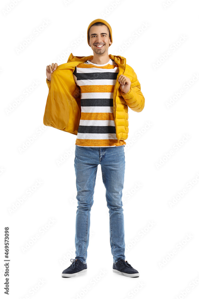 Handsome young man in yellow hat and jacket on white background Stock ...