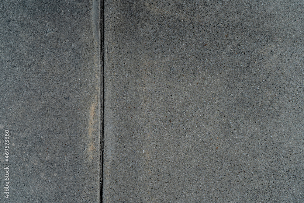 Fototapeta premium Sidewalk and street concrete asphalt texture with stains and wear