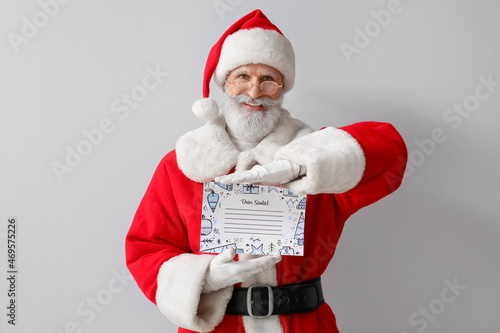 Santa Claus with empty lett...