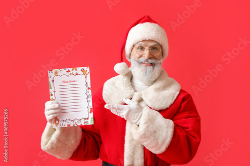 Santa Claus with blank lett...