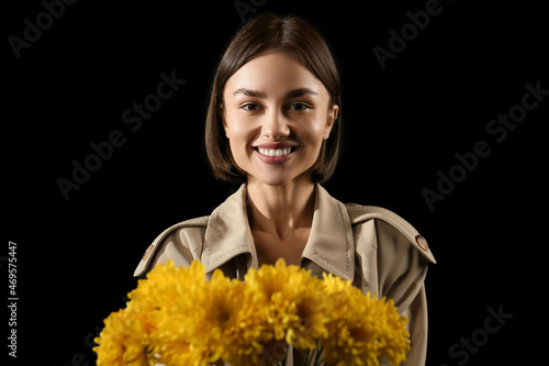 Pretty young woman with bou...