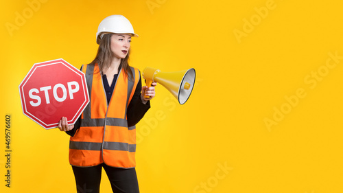 Woman with a loudspeaker an...