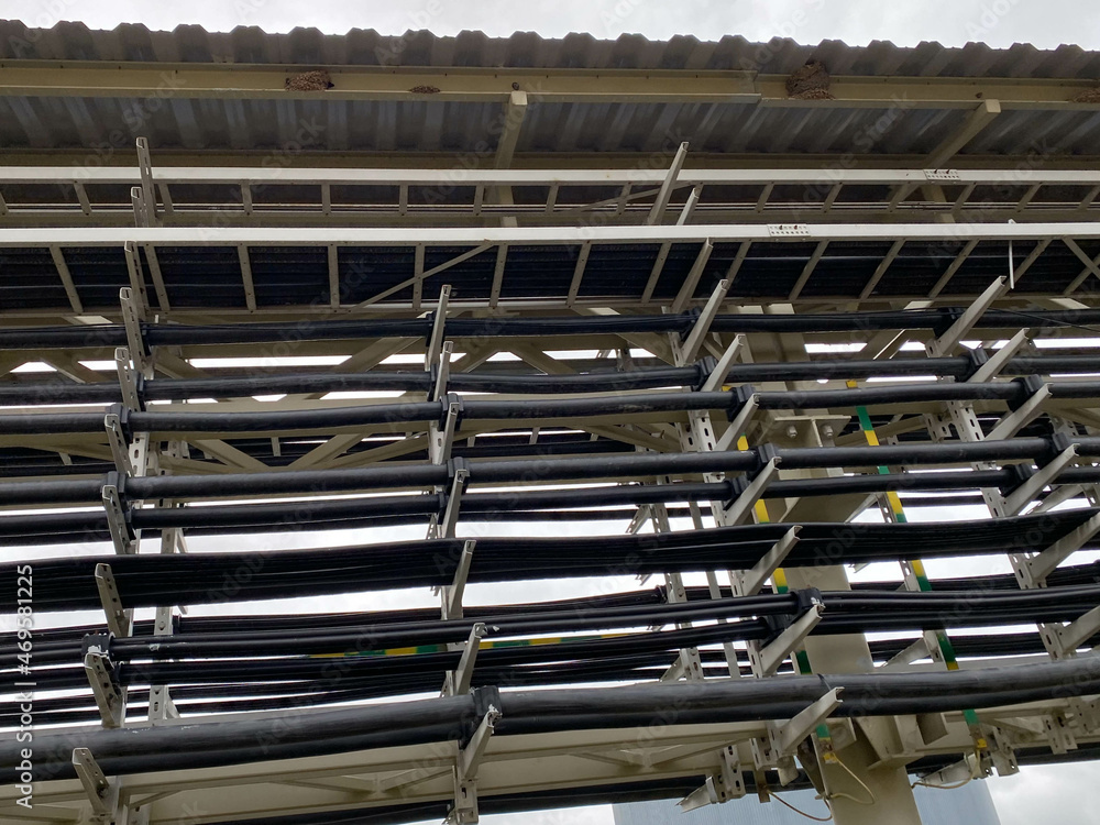 Electrical cable trays with cables in an industrial site