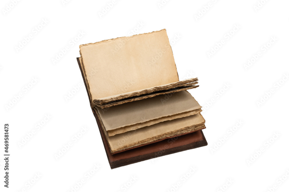 An open empty old notebook isolated on a white background. An open empty old notebook isolated on a white background.