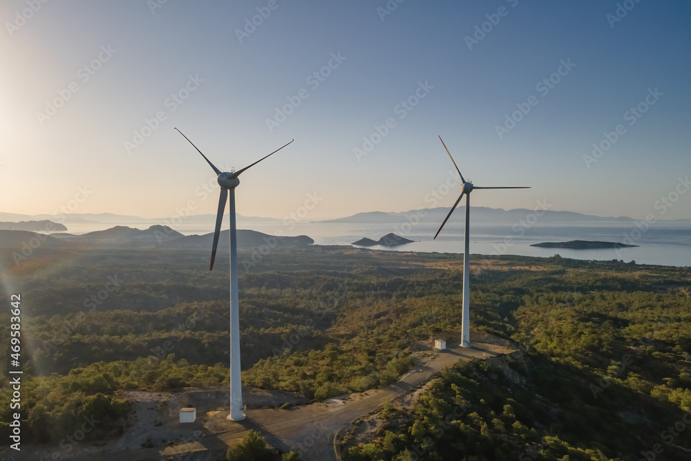 Carbon neutral and Renewable Energy wind farm Wind Turbine. Green and renewable power concept