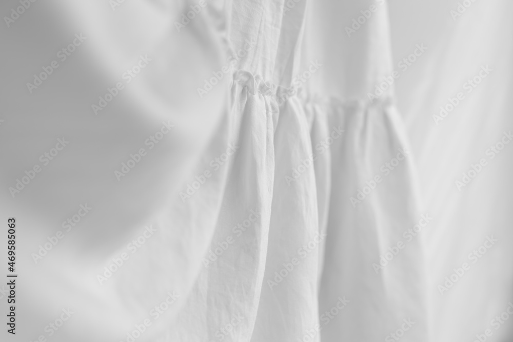 White fabric close up with copy space. Abstract textile canvas drapery. White fabric close up with copy space. Abstract textile canvas drapery.