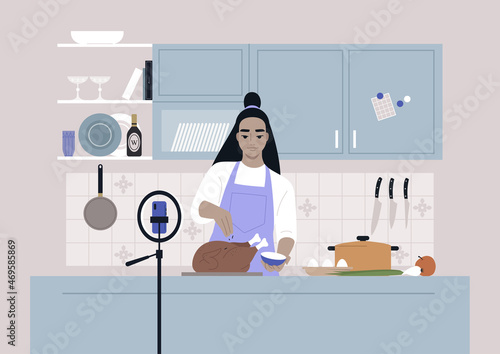 A culinary show, a young female Asian character cooking a roasted turkey on camera, a mobile phone on a tripod