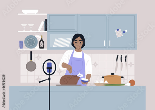 A culinary show, a young female Caucasian character cooking a roasted turkey on camera, a mobile phone on a tripod