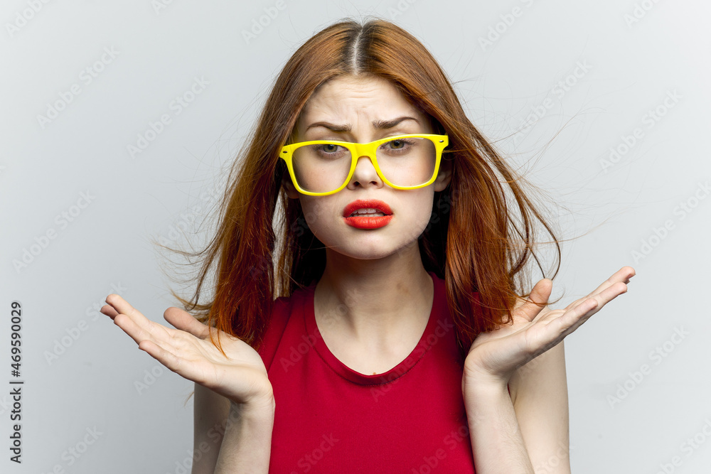 pretty woman yellow glasses hairstyle fashion close-up pretty woman yellow glasses hairstyle fashion close-up