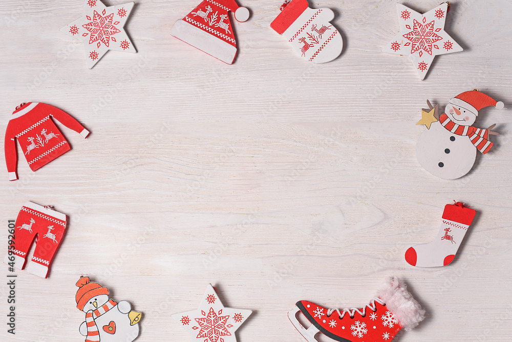 Obraz premium Frame made of Christmas or New Year decorations on white background. Flat lay, top view, isolated, copy space.