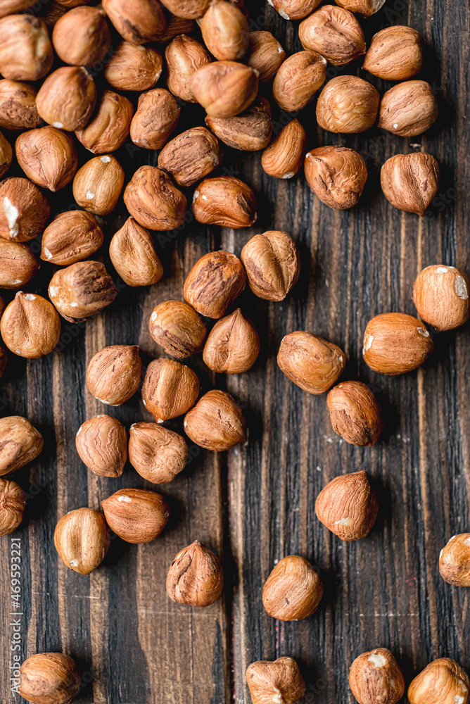 hazelnuts on wooden background hazelnuts on wooden background