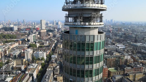 antennas and windows at tall telecommunication BT tower. Cityscape in background photo
