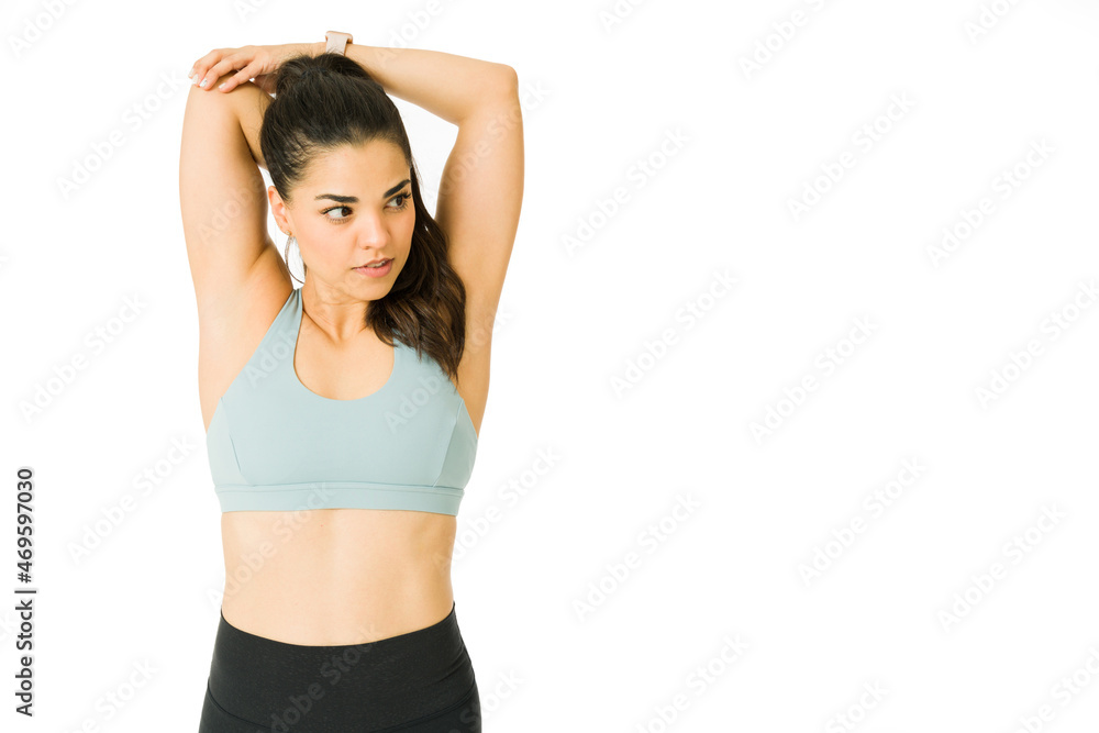 Strong fit woman getting ready to work out Strong fit woman getting ready to work out