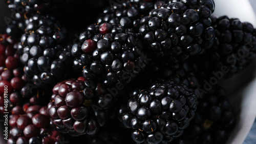 Blackberries close up in macro view for fruit background.