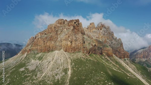 Aerial around view on Mother-in-law teeth mountain with fantastic cliffs in Kabardino-Balkaria, Caucasus, Russia, 4k photo