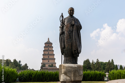 Statue of famous Monk Xuanzang of Tang Dynasty in the park in front of Histrotic Giant Wild Goose Pagoda, Xi'an, Shaanxi, China, built in Tang Dynasty. UNESCO World Heritage.