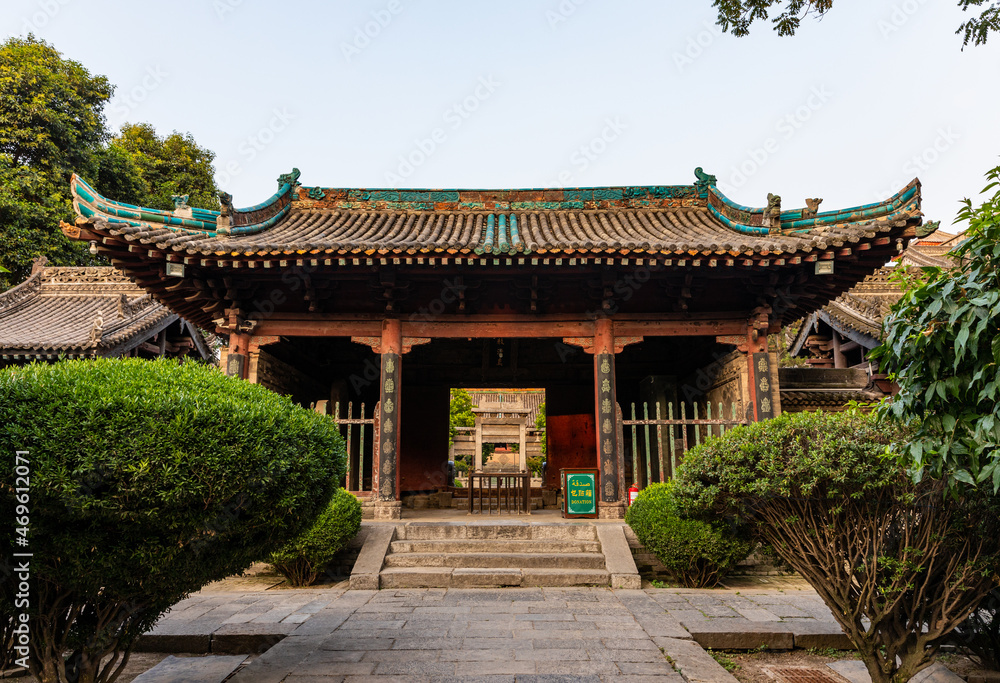 Traditional-style gate at Great Mosque in Chinese style at Muslim Quarter, Xi'an, Shaanxi, China, first build in 8th Century. Heirtage and tourist attraction. Traditional-style gate at Great Mosque in Chinese style at Muslim Quarter, Xi'an, Shaanxi, China, first build in 8th Century. Heirtage and tourist attraction.