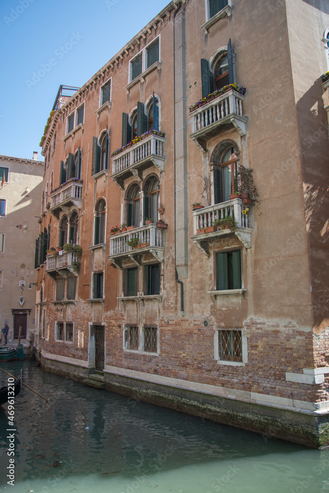 The facade of a building in Venice in March, Italy 2019, Old architecture The facade of a building in Venice in March, Italy 2019, Old architecture