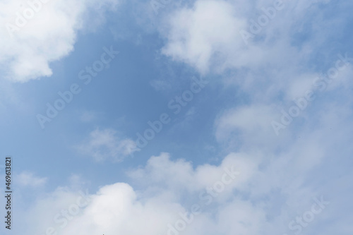 Beautiful clouds during spring time in a Sunny day. Blue sky and white fluffy clouds