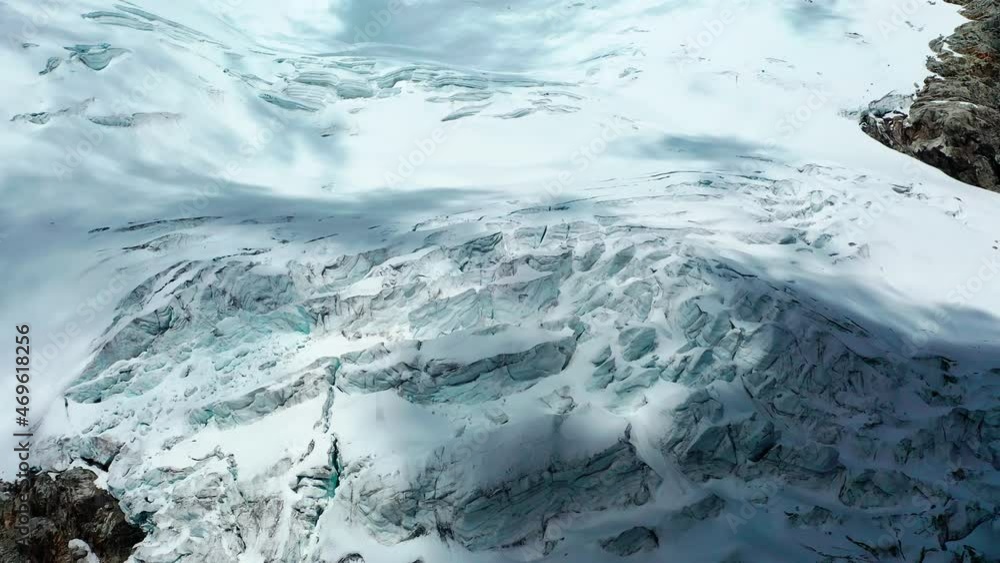 Flying towards a glacier in the Andes of Peru to view a glacier that is melting and shrinking doe to global warming Flying towards a glacier in the Andes of Peru to view a glacier that is melting and shrinking doe to global warming