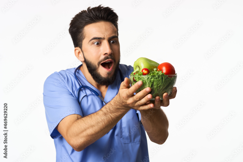 male doctor plate with vegetables healthy food nutritionist male doctor plate with vegetables healthy food nutritionist