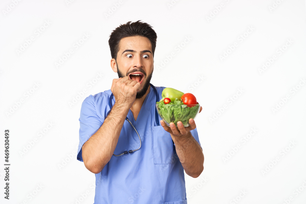 male doctor plate with vegetables healthy food nutritionist male doctor plate with vegetables healthy food nutritionist