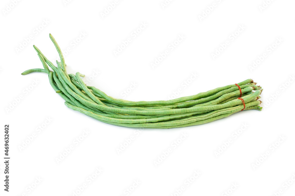Fresh vegetables tied with rubber Green lentils isolated on a white background. Fresh vegetables tied with rubber Green lentils isolated on a white background.