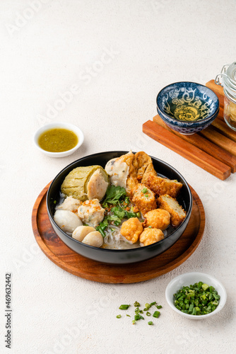 Yong tau foo , yong tau fu or Liong Tahu (In Indonesia). is a Hakka Chinese cuisine consisting primarily of tofu filled with ground meat mixture or fish paste. photo