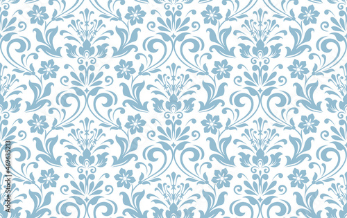 Wallpaper in the style of Baroque. Seamless vector background. White and blue floral ornament. Graphic pattern for fabric, wallpaper, packaging. Ornate Damask flower ornament