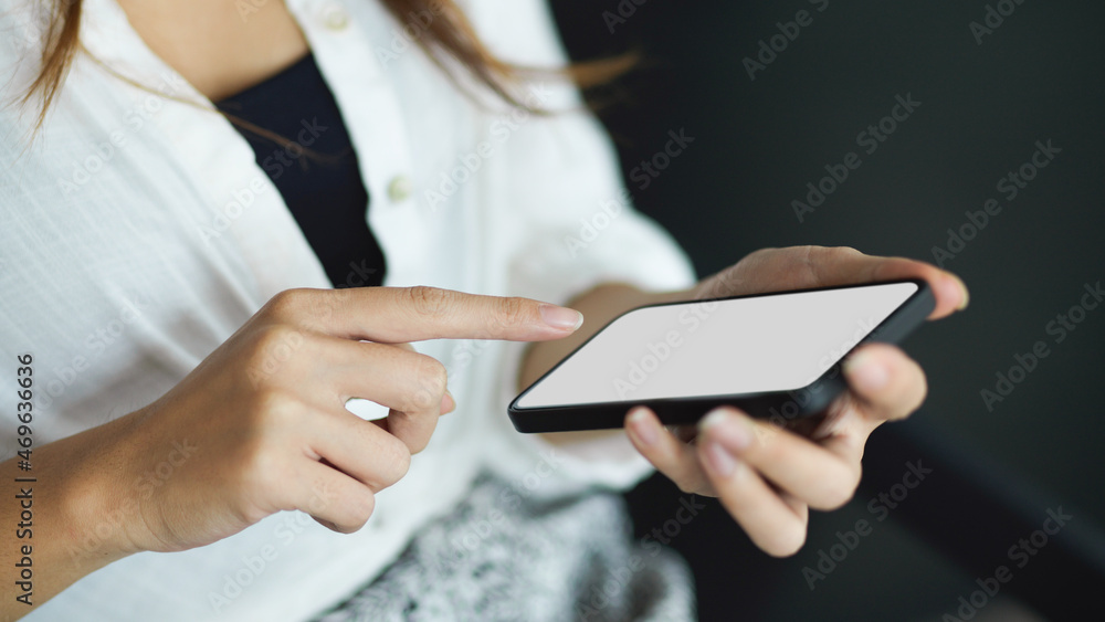 Female using modern smartphone with empty screen Female using modern smartphone with empty screen