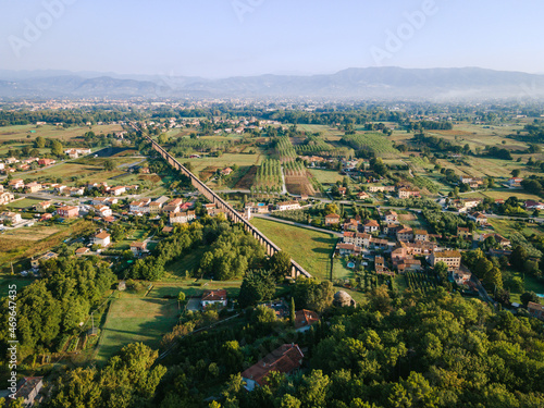 Aerial view of old aqueduct in Italy. Neoclassical style Lucca Tuscany. Acquedotto del Nottolini. Classic Italian countryside.