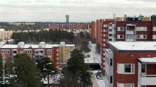 Snowy Winter Scene, Aerial Flypast Red High Rise Apartments Stockholm photo