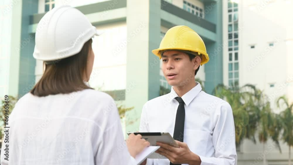Two Engineer talking discussion for working plan factory industrial Two Engineer talking discussion for working plan factory industrial