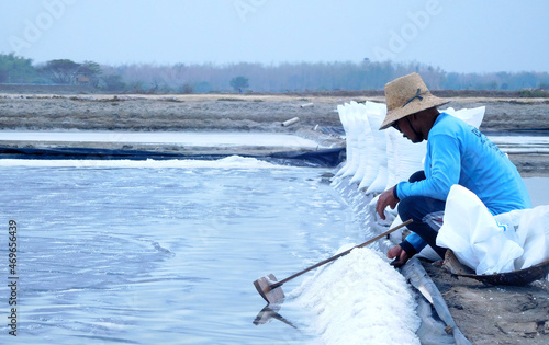 Salt farmer from Karangsekar Village, Rembang Jawa Tengah photo