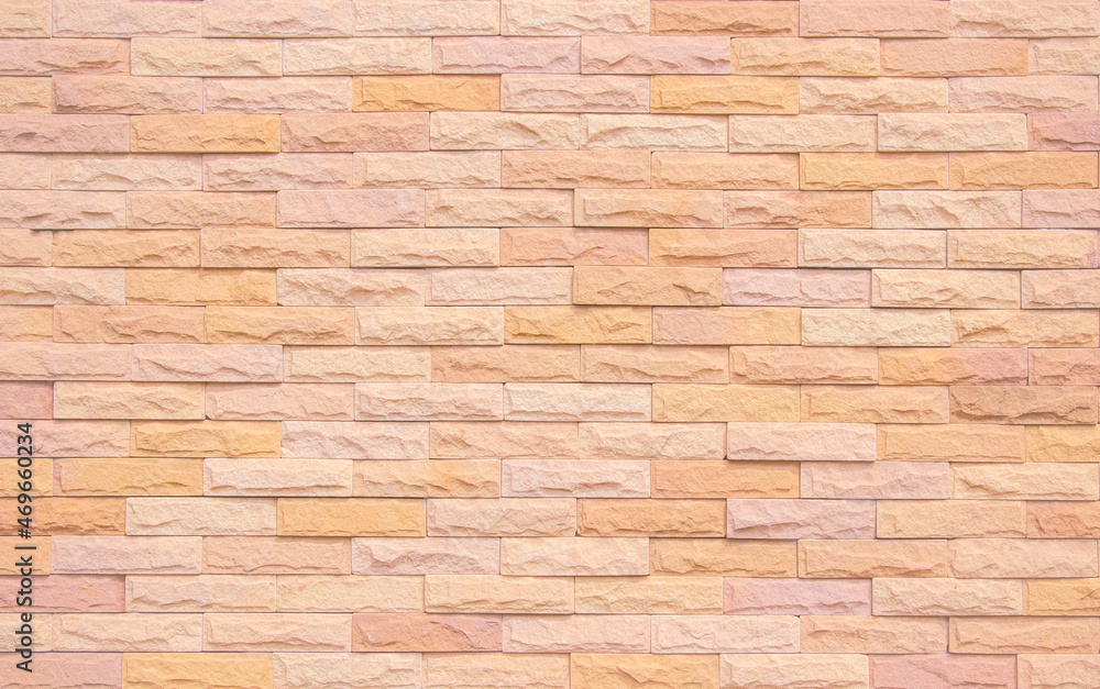 Orange and white brick wall texture background. Brickwork and stonework flooring interior rock old. Background old vintage brick wall backdrop