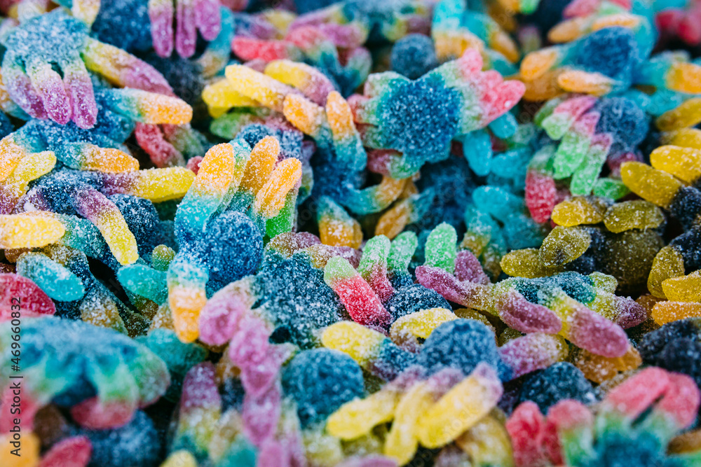 Colorful gummy sweets in the store. Background from sweets