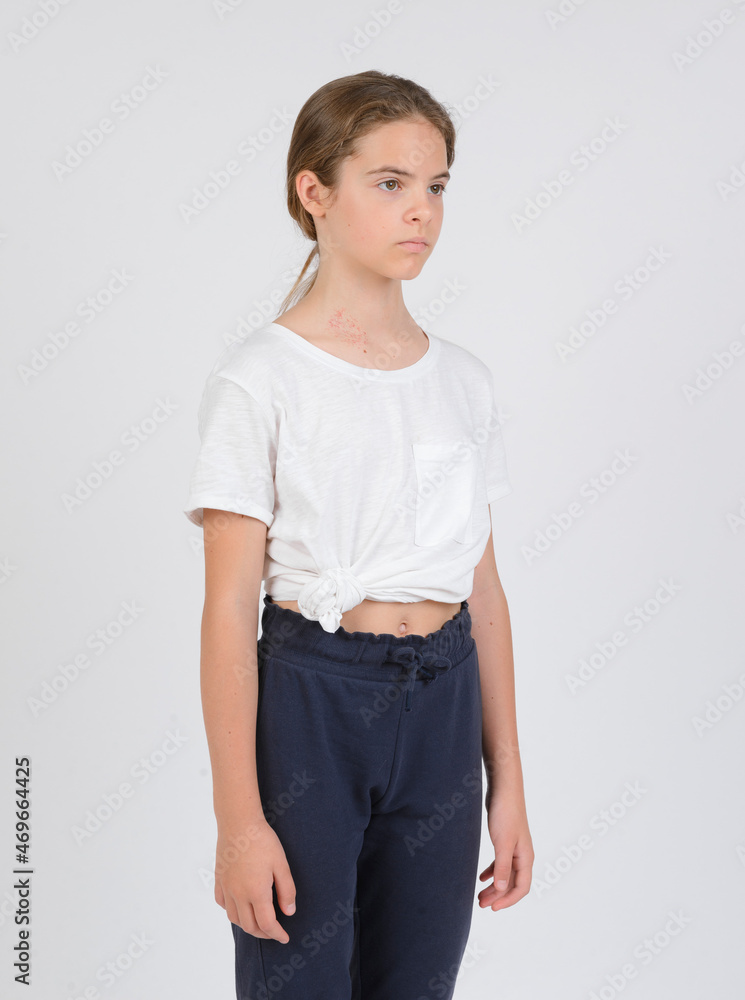 model samples , waist high portrait , white girl 11 years old in dark pants and a white shirt on a white model samples , waist high portrait , white girl 11 years old in dark pants and a white shirt on a white