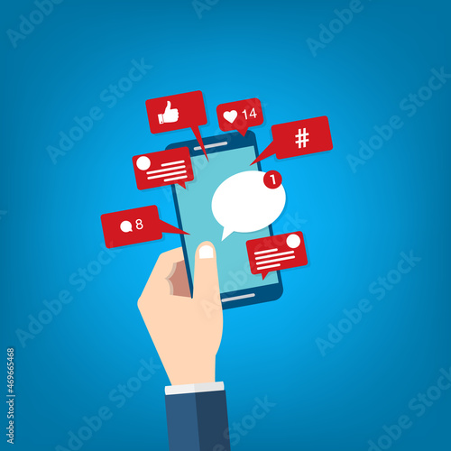 Social Media Smart Phone, Viral content, social media marketing and social media activity - likes, shares and comments popping up on the mobile screen