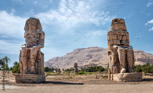 Egypt. Luxor. The Colossi of Memnon - two massive stone statues of Pharaoh Amenhotep III