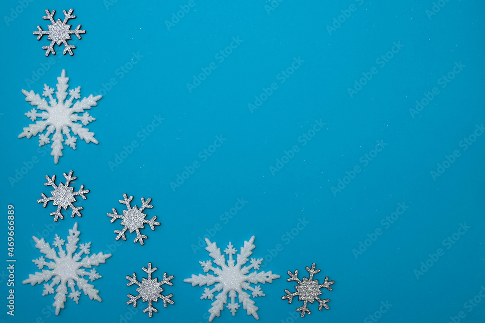 Christmass flatlay white snowflakes in shape frame Christmass flatlay white snowflakes in shape frame
