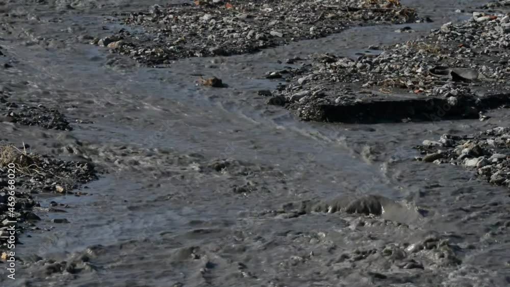 river of mud and water rushes towards the sea after intersting rains river of mud and water rushes towards the sea after intersting rains