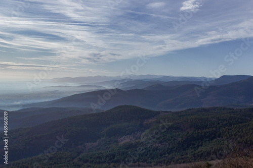 panorama view over the hills in the Vosges / France. The valleys are filled with fog.